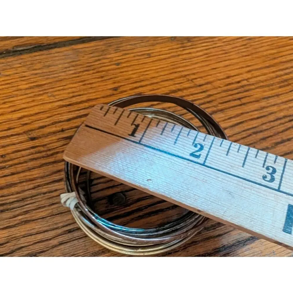 Vintage Stack Of Silver And Copper Bangels Bracelets